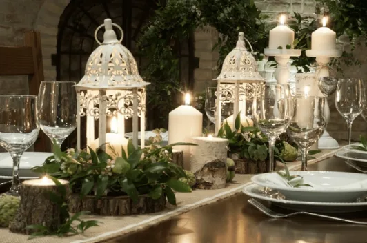 rustic-candlelit-event-table-centrepiece.webp
